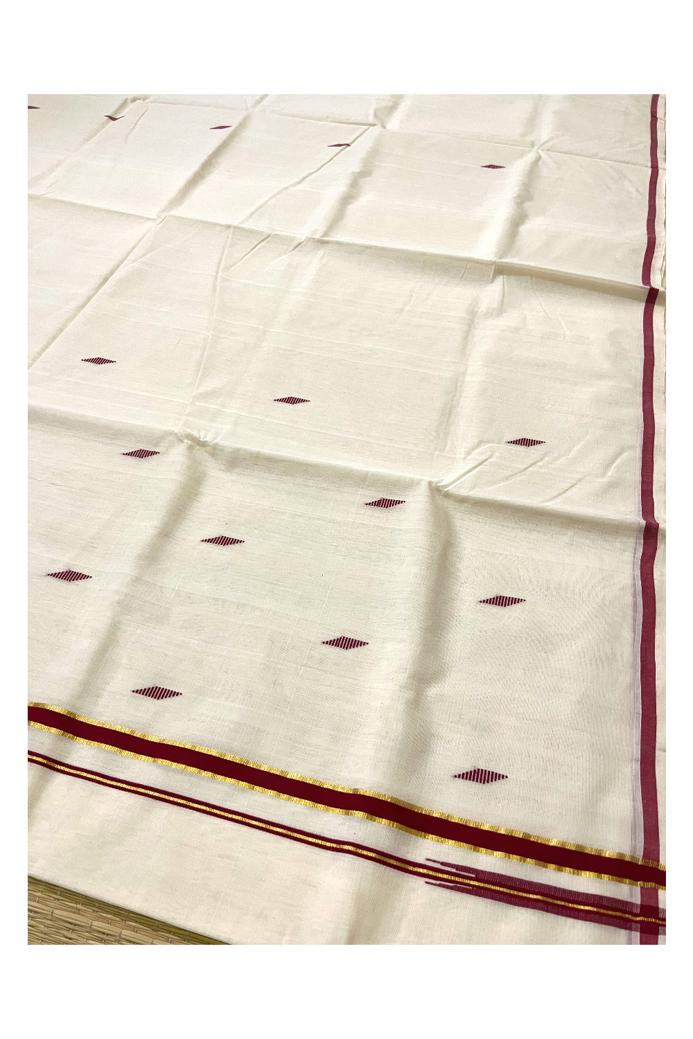 Southloom Premium Unakkupaavu Handloom Maroon Puliyilakkara Kasavu Saree with Butta Works