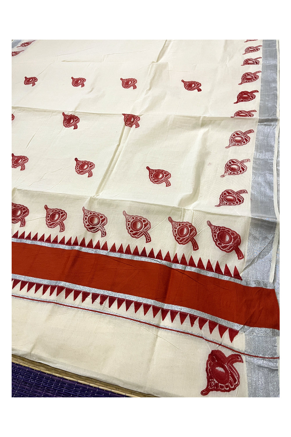 Pure Cotton Kerala Saree with Orange Leaf Block Prints and Silver Kasavu Temple Border