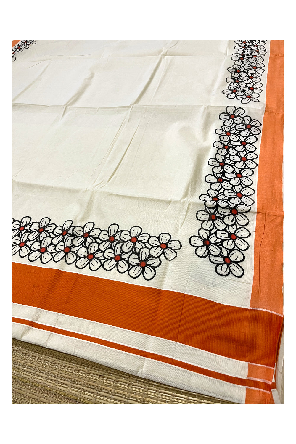 Pure Cotton Kerala Saree with Black Floral Block Prints and Orange Border