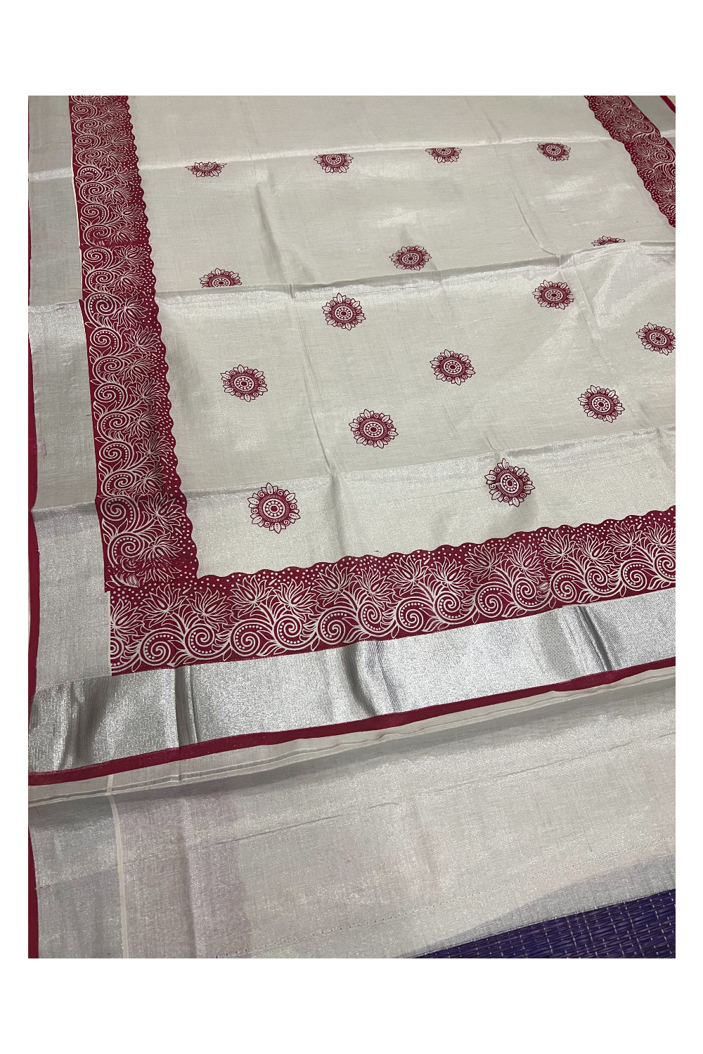 Kerala Silver Tissue Kasavu Saree with Mural Printed Maroon Floral Design