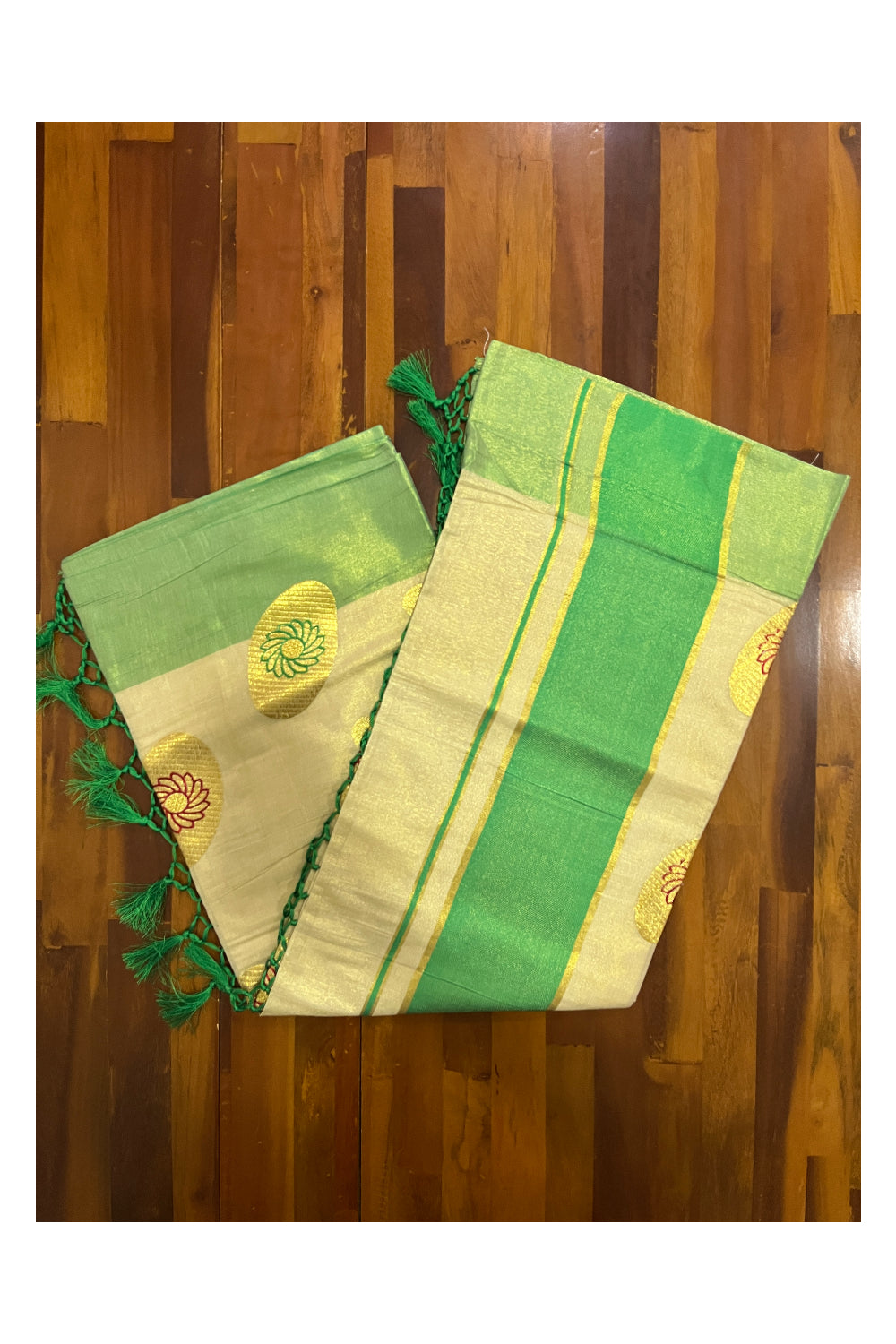 Kerala Tissue Kasavu Saree with Embroidery Works and Green Border