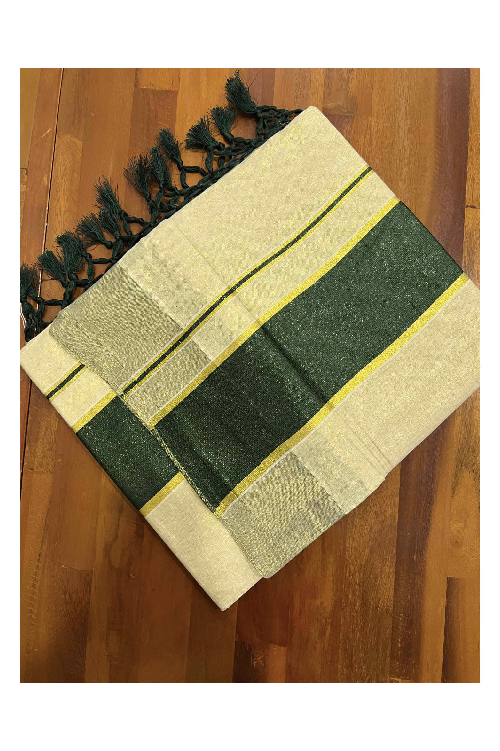 Kerala Kasavu Tissue Saree with Dark Green Kara and Border with Tassels