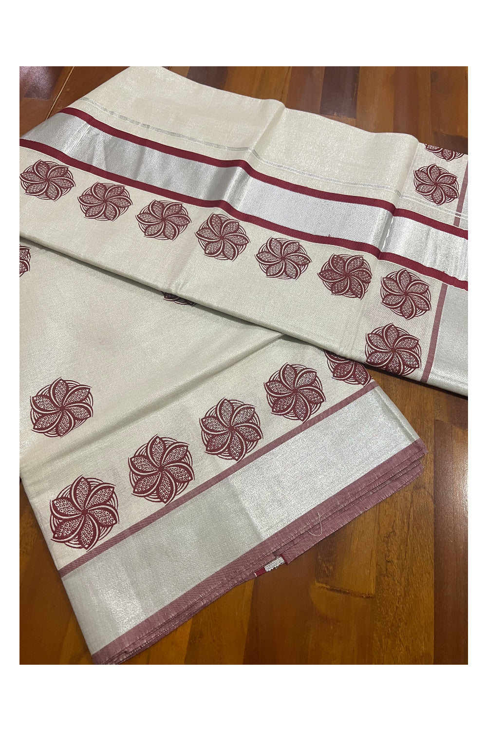 Kerala Silver Tissue Kasavu Saree with Maroon Floral Mural Prints on Pallu