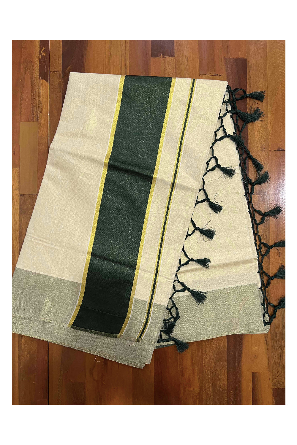 Kerala Kasavu Tissue Saree with Dark Green Kara and Border with Tassels