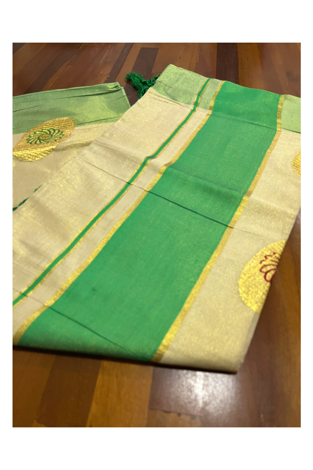 Kerala Tissue Kasavu Saree with Embroidery Works and Green Border