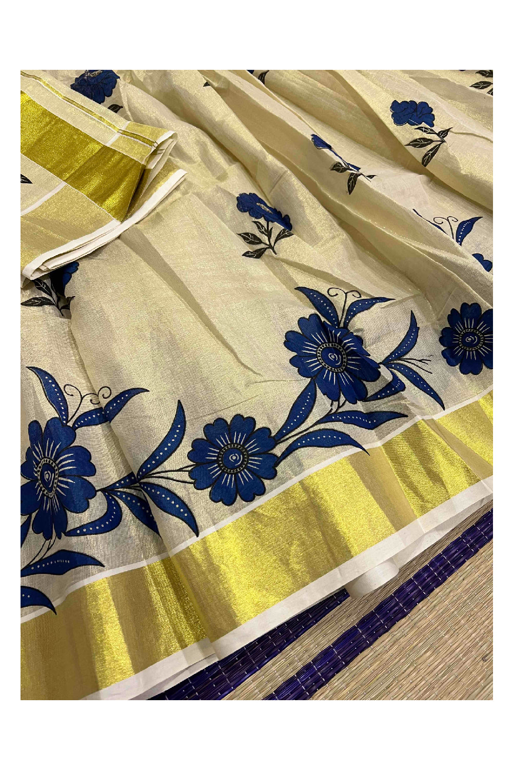 Kerala Tissue Stitched Dhavani Set with Blouse Piece and Neriyathu in with Blue Accents and Mural Designs
