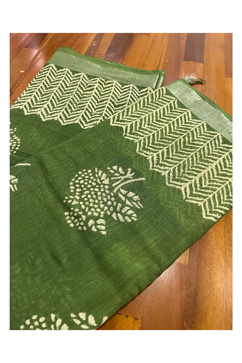 Southloom Linen Green Designer Saree with White Prints and Tassels on Pallu