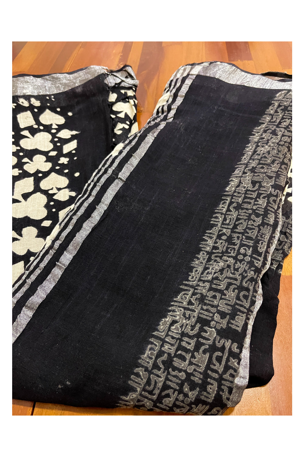 Southloom Linen Designer Black Saree with White Prints and Tassels Works