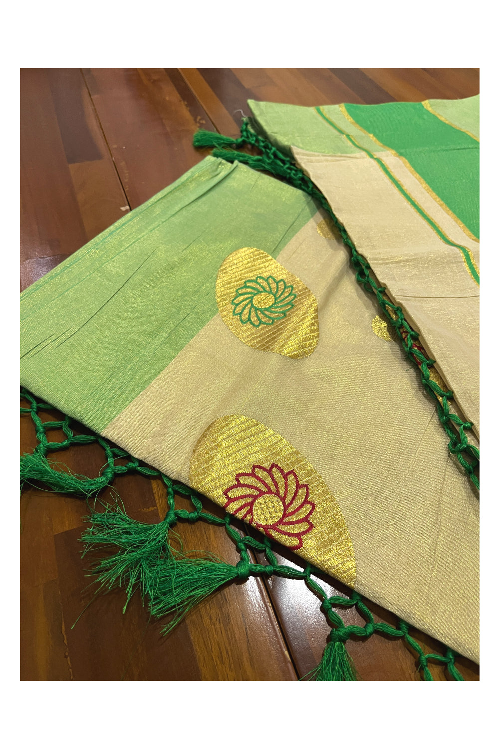 Kerala Tissue Kasavu Saree with Embroidery Works and Green Border