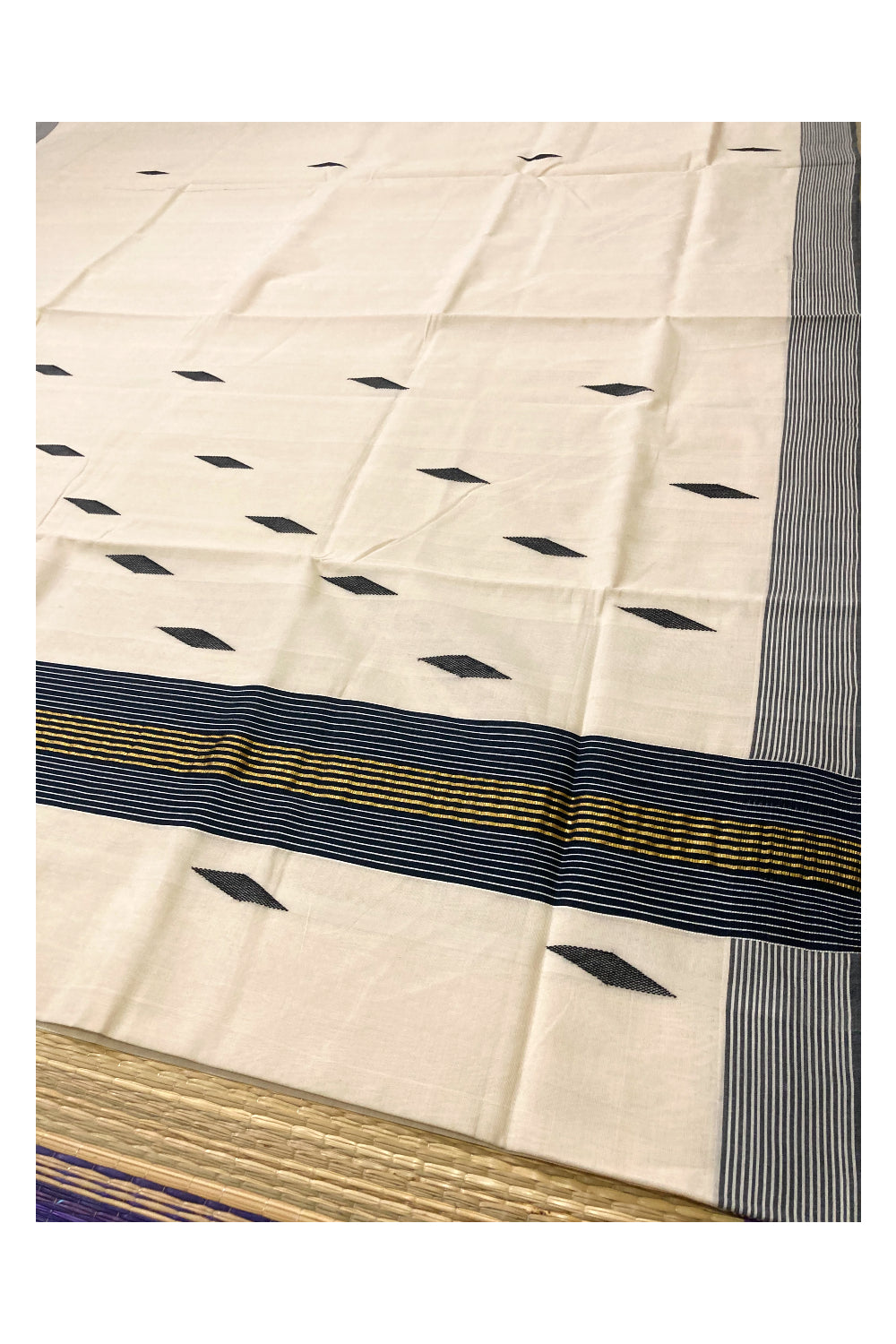 Southloom Premium Unakkupaavu Handloom Kerala Saree with Black and Pure Kasavu Border and Butta Works on Body