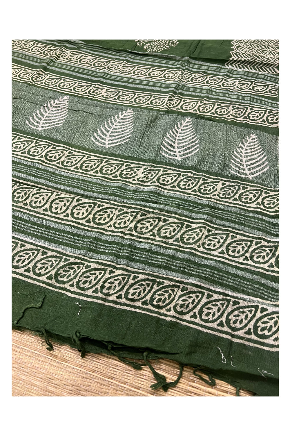 Southloom Linen Green Designer Saree with White Prints and Tassels on Pallu