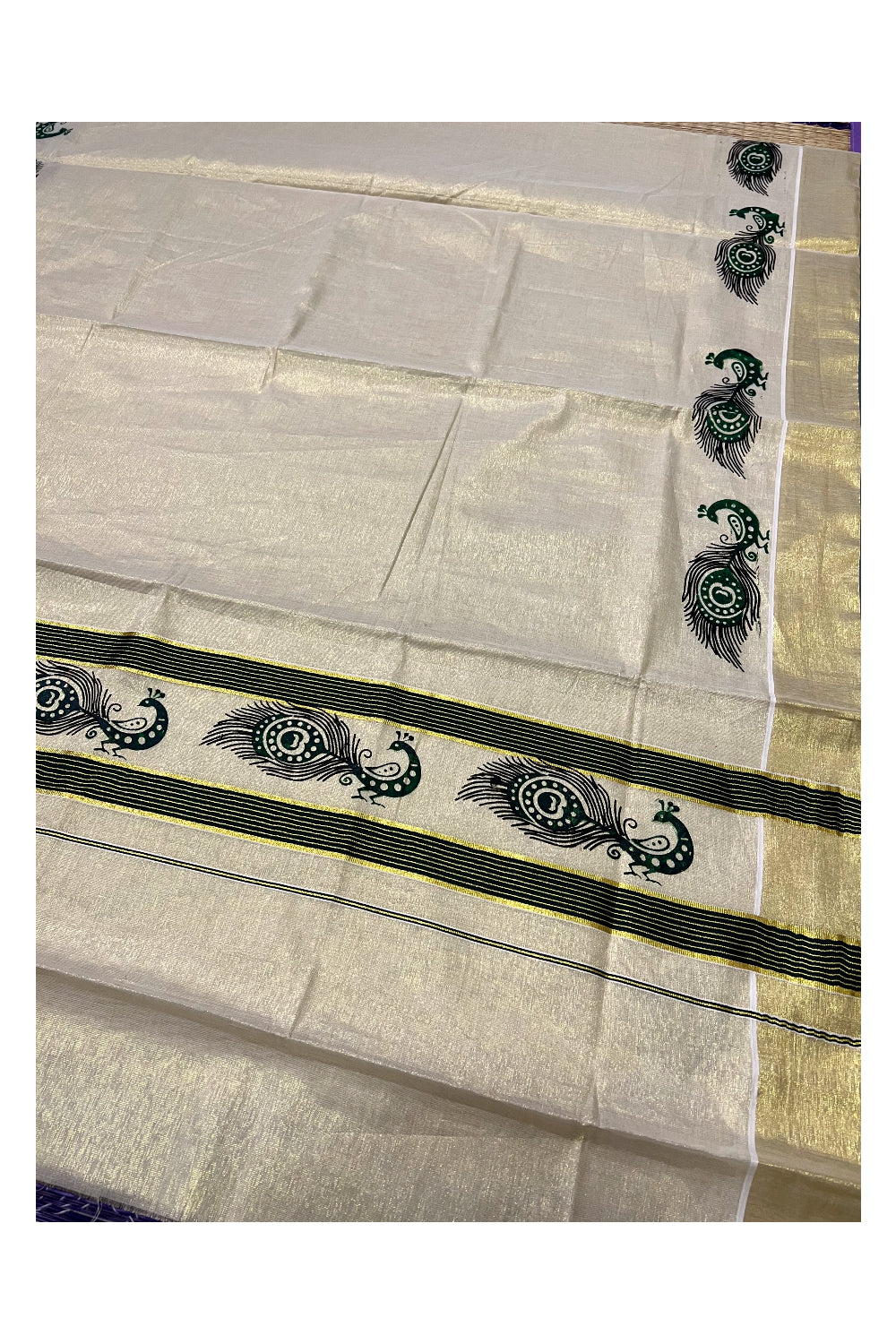 Kerala Tissue Kasavu Saree with Dark Green Peacock Block Printed Design