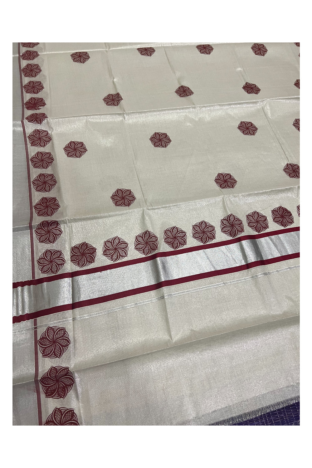 Kerala Silver Tissue Kasavu Saree with Maroon Floral Mural Prints on Pallu