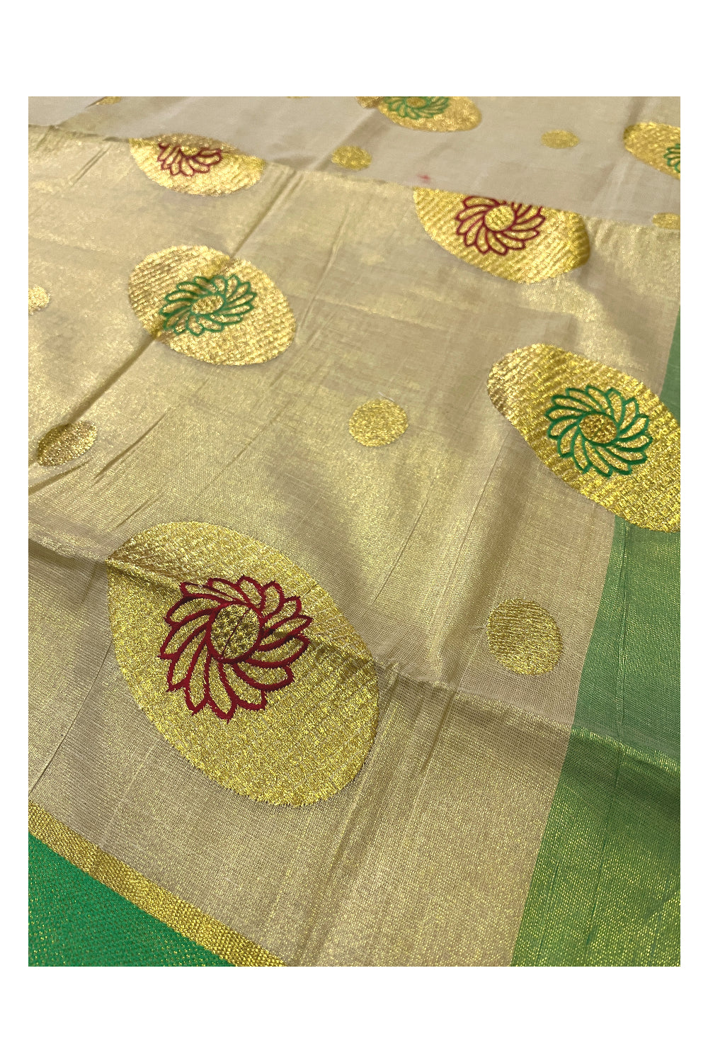 Kerala Tissue Kasavu Saree with Embroidery Works and Green Border