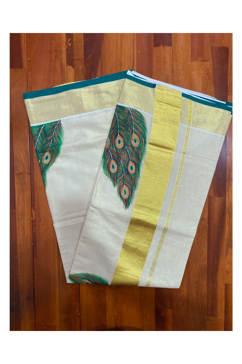 Kerala Tissue Kasavu Saree with Hand Painted Feather Design and Dark Green on Border