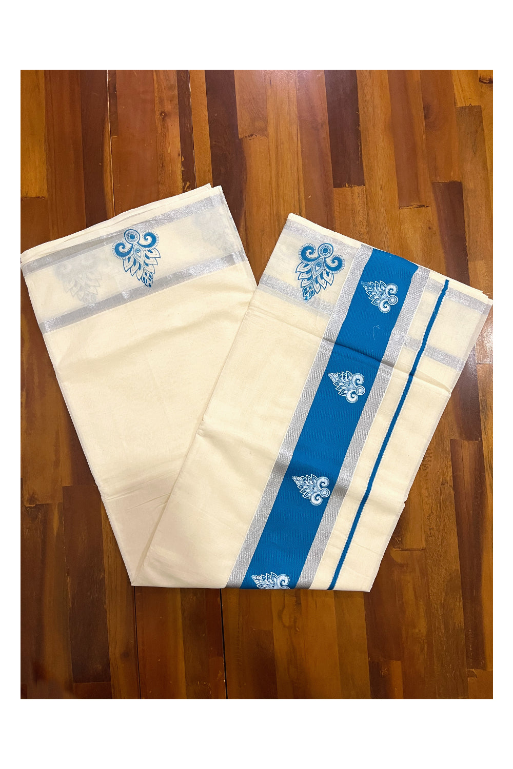 Pure Cotton Kerala Silver Kasavu Saree with White Block Printed Design in Blue Pallu