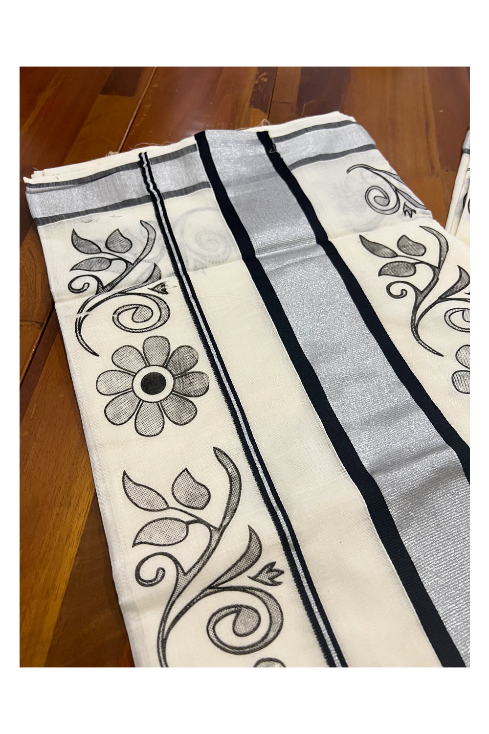 Pure Cotton Kerala Silver Kasavu Saree with Black Floral Block Printed Design