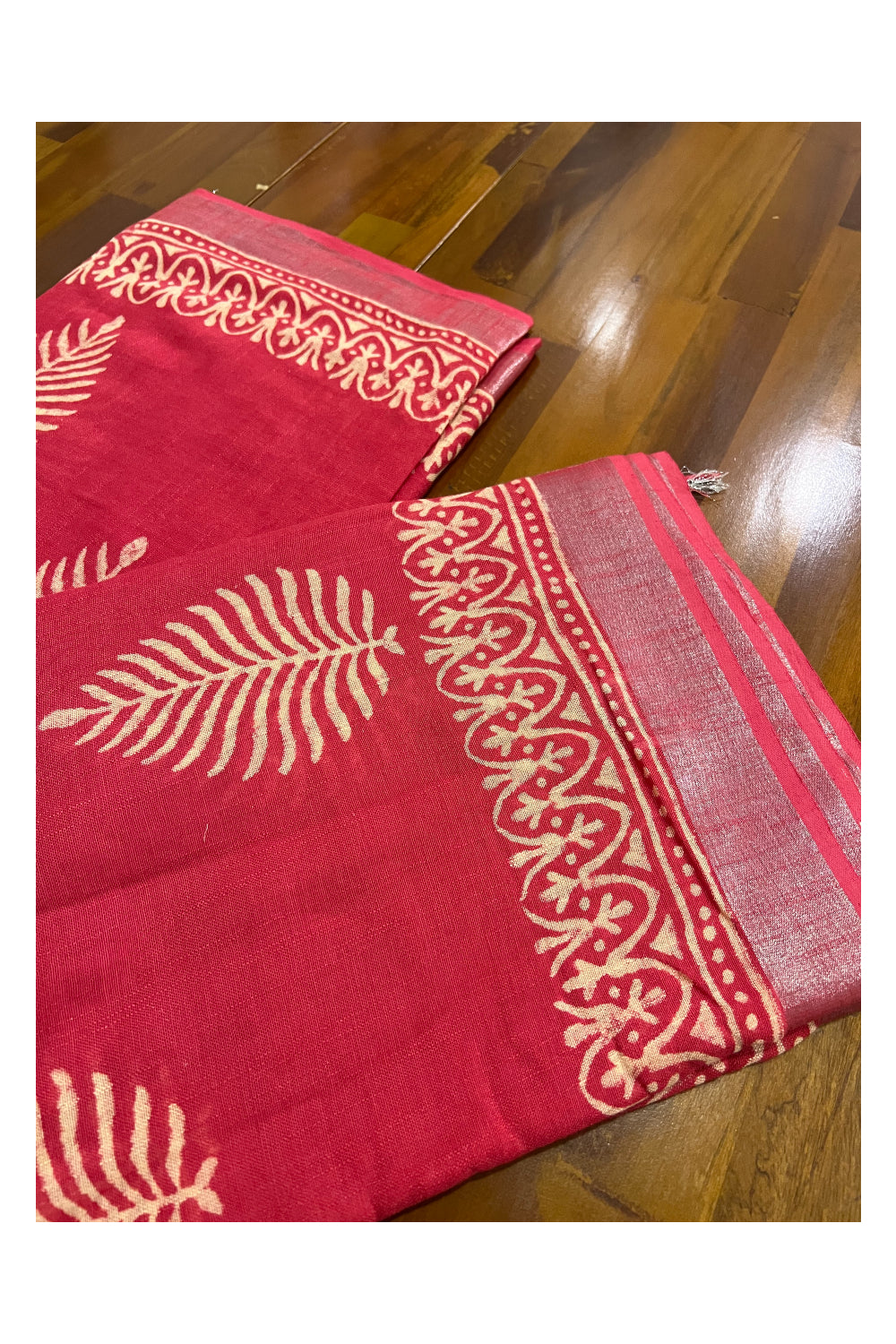 Southloom Linen Pinkish Red Designer Saree with White Prints and Tassels on Pallu