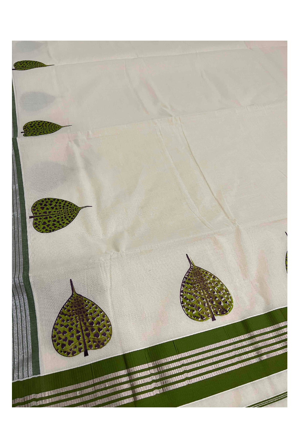 Pure Cotton Kerala Silver Kasavu and Green Border Saree with Mural Leaf Prints