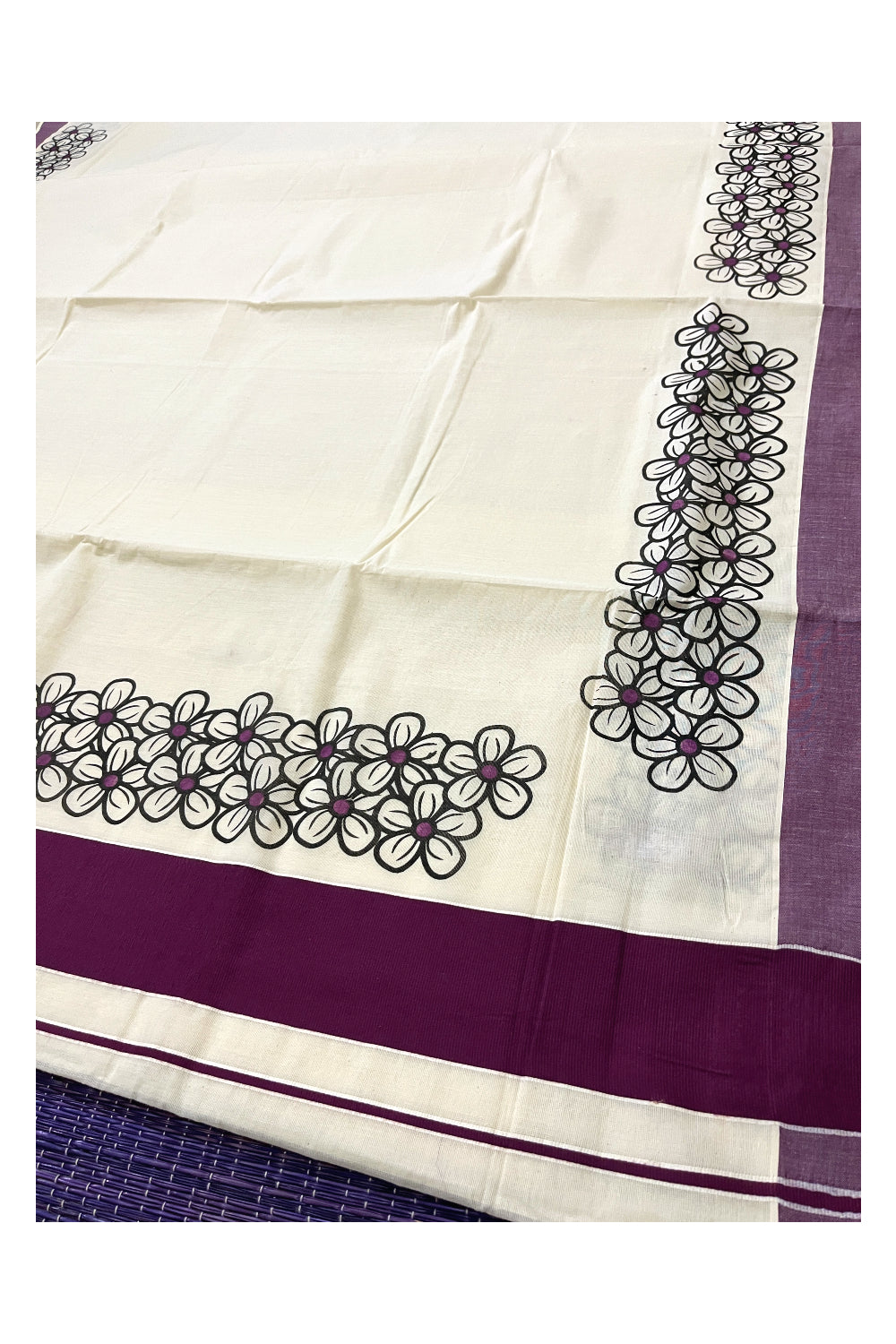 Pure Cotton Kerala Saree with Black Floral Block Prints and Purple Border