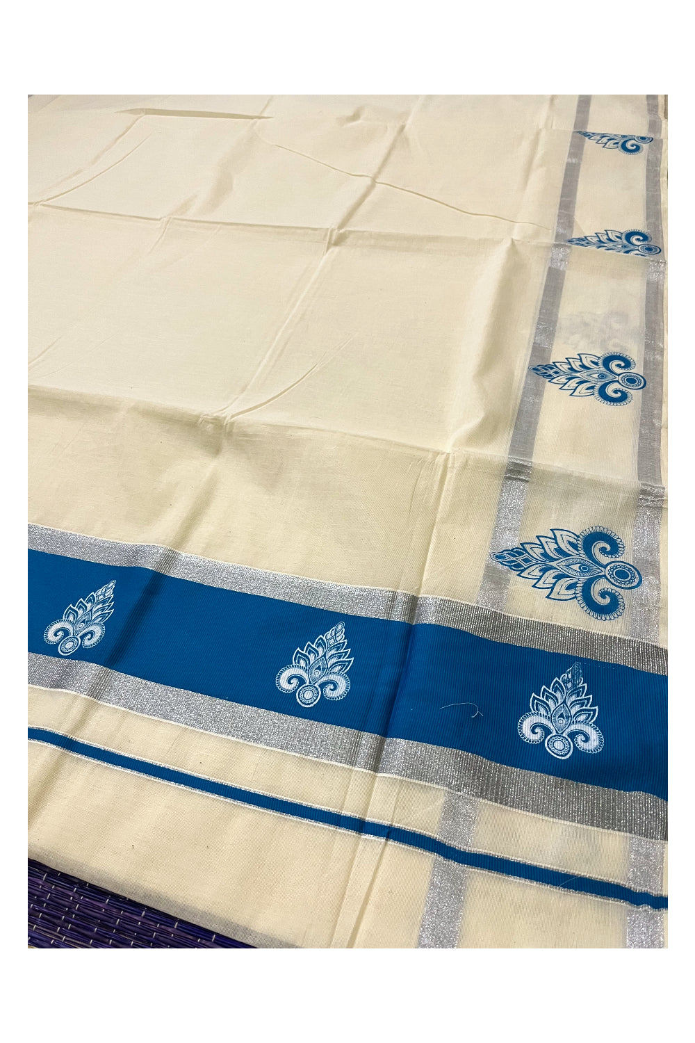 Pure Cotton Kerala Silver Kasavu Saree with White Block Printed Design in Blue Pallu