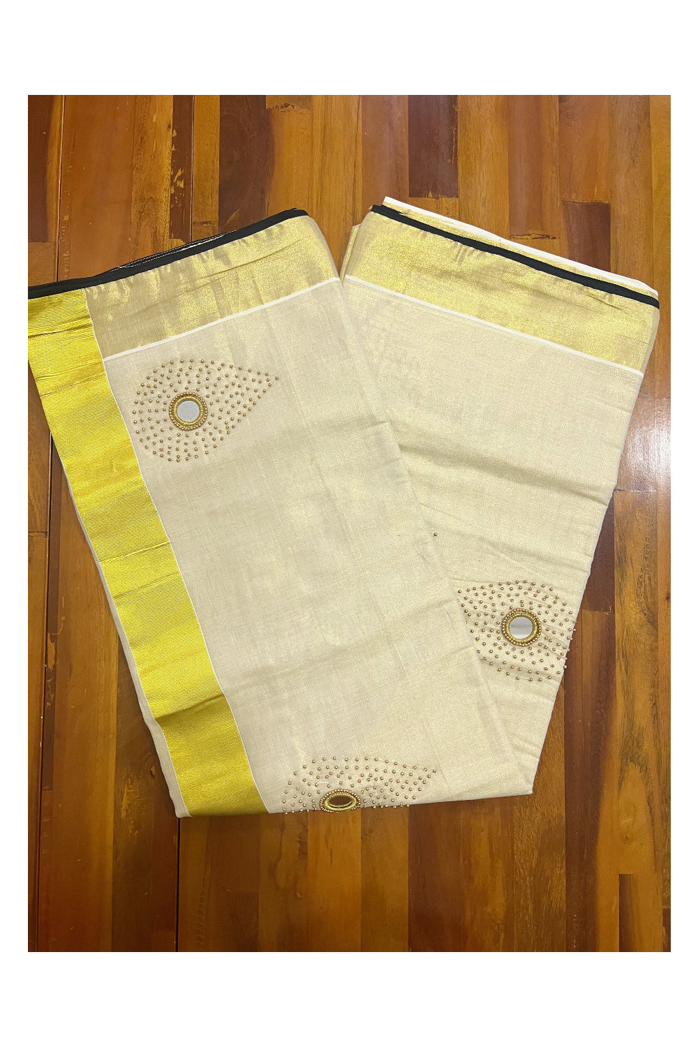 Kerala Tissue Kasavu Saree with Bead and Mirrorwork Design and Black Piping Works on Border