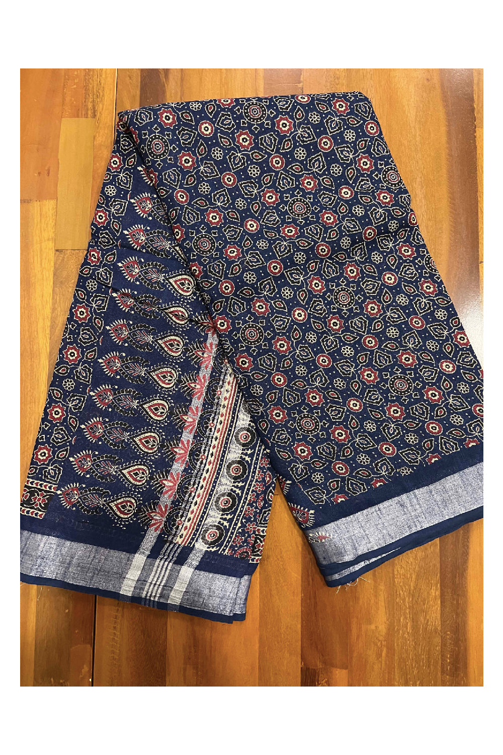 Southloom Linen Designer Saree with Ajrakh Prints on Dark Blue Body and Tassels on Pallu