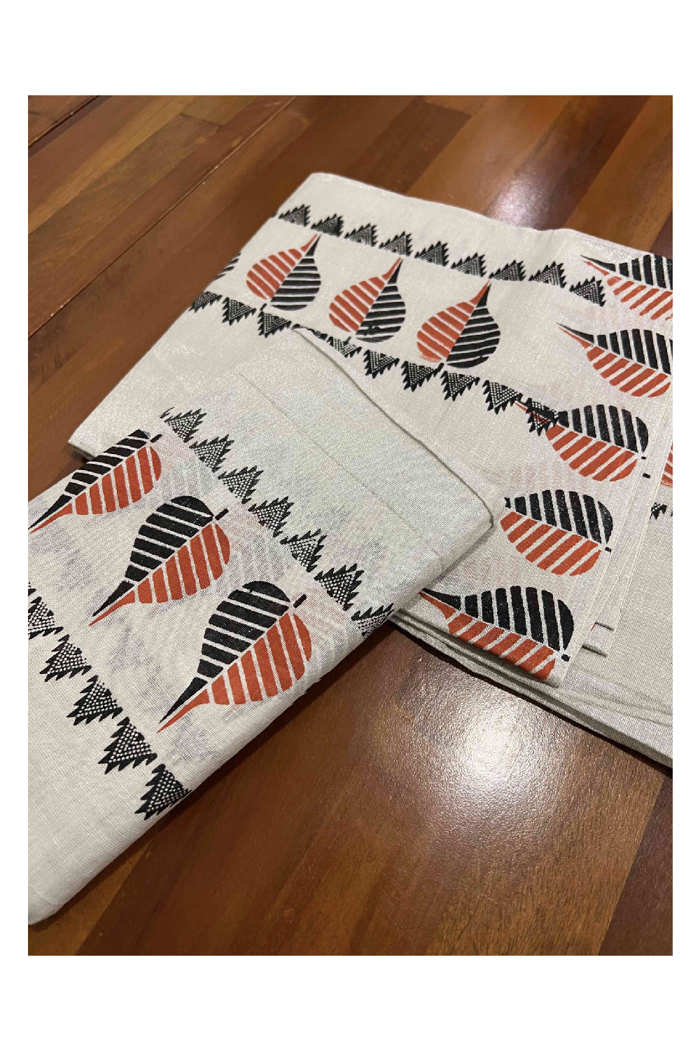 Kerala Silver Tissue Kasavu Set Mundu (Mundum Neriyathum) with Black and Orange Block Printed Border