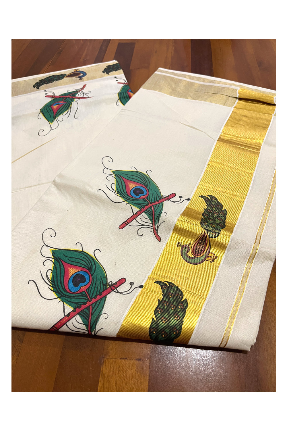 Kerala Pure Cotton Saree with Feather and Flute Mural Prints and Printed Kasavu Border