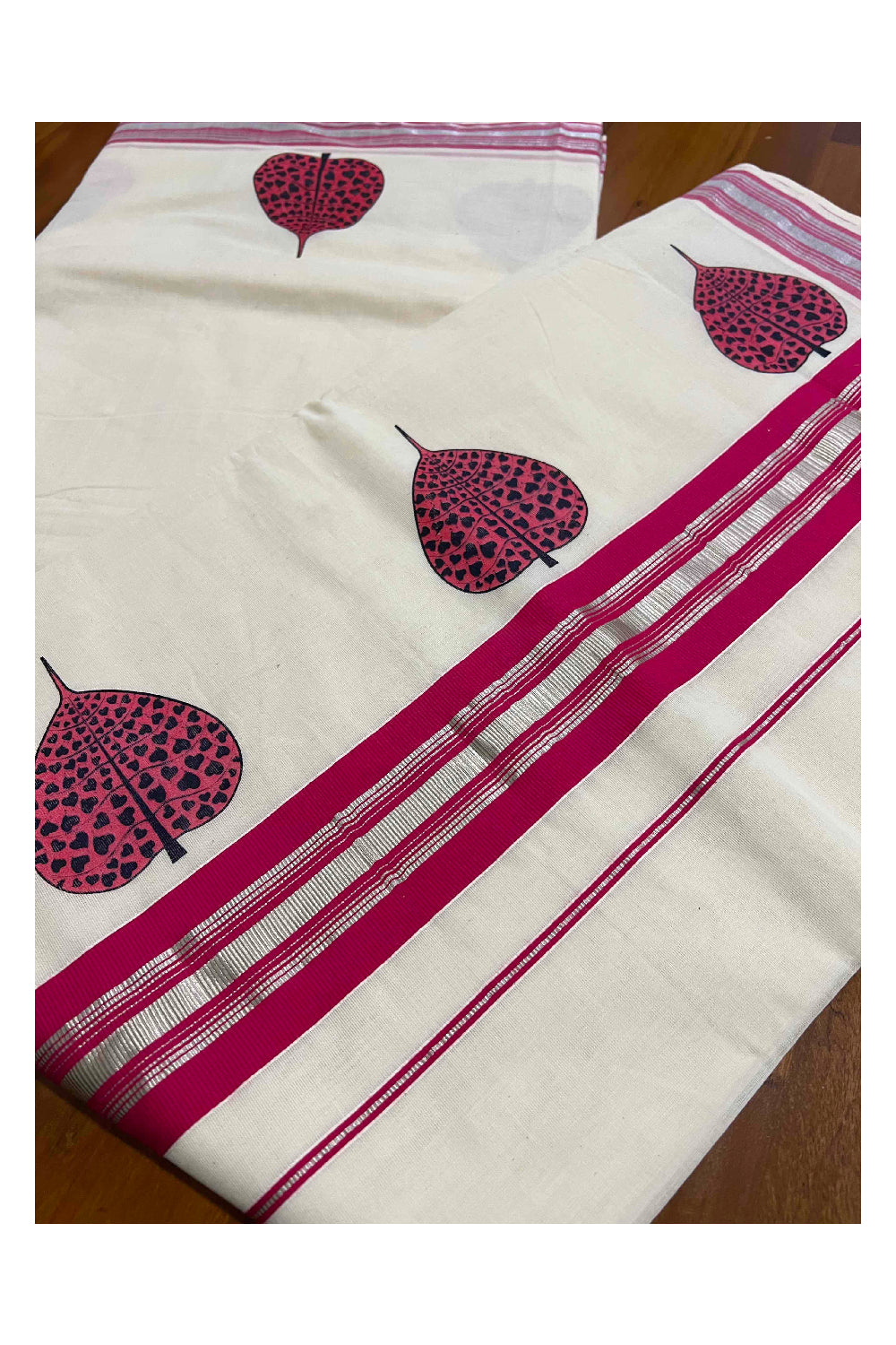 Pure Cotton Kerala Silver Kasavu and Dark Pink Border Saree with Mural Leaf Prints