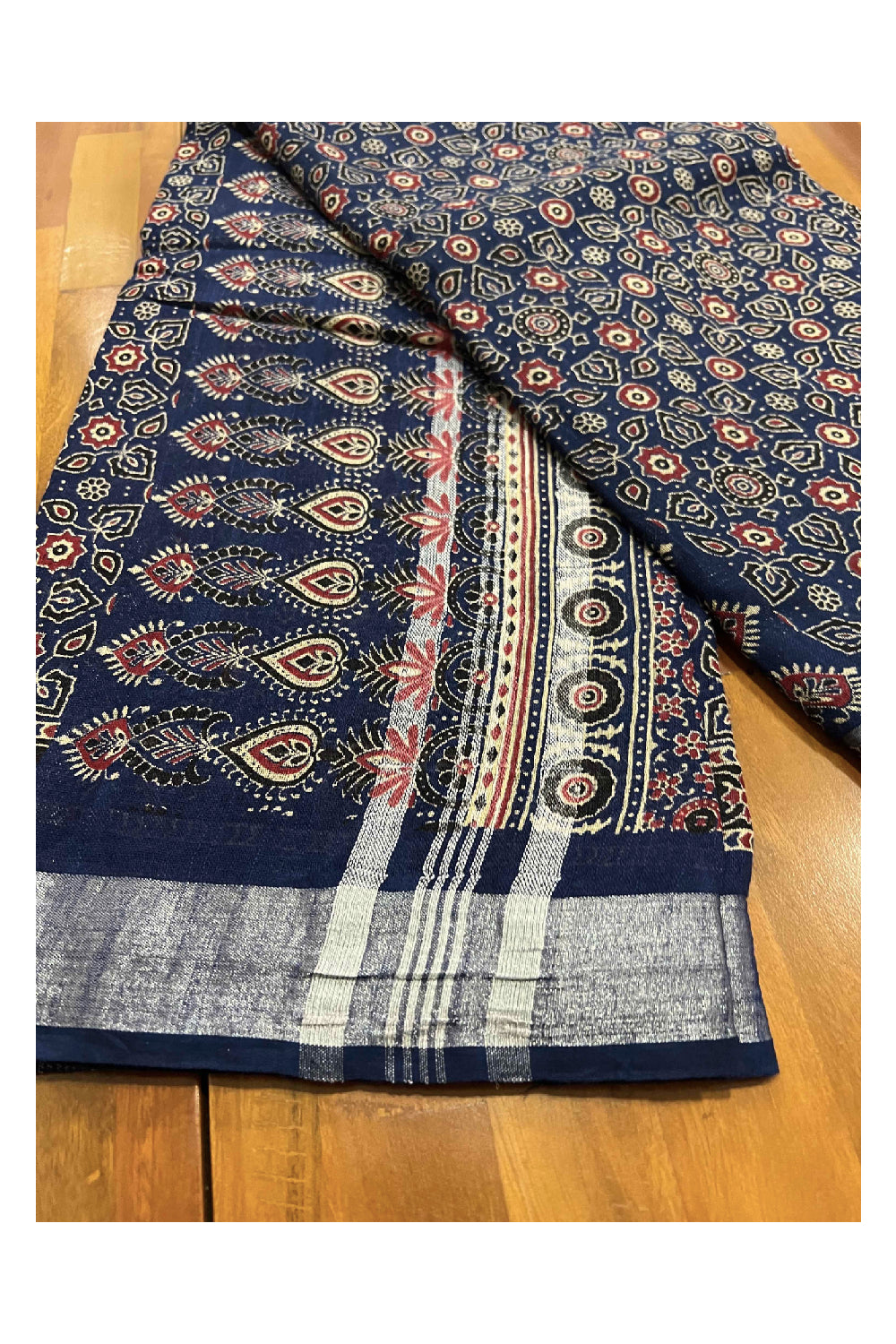 Southloom Linen Designer Saree with Ajrakh Prints on Dark Blue Body and Tassels on Pallu