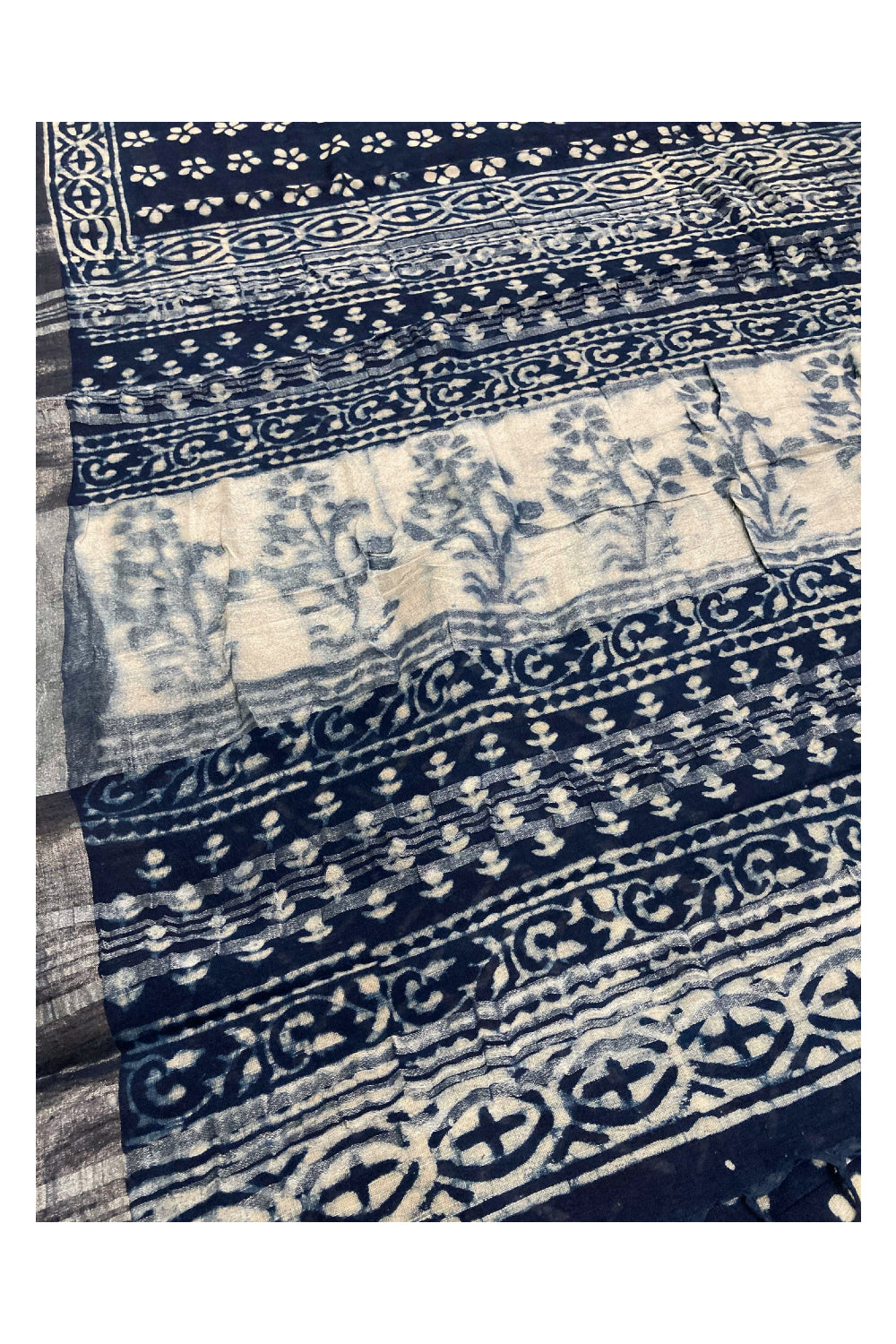 Southloom Linen Blue Designer Saree with White Floral Patterns and Tassels