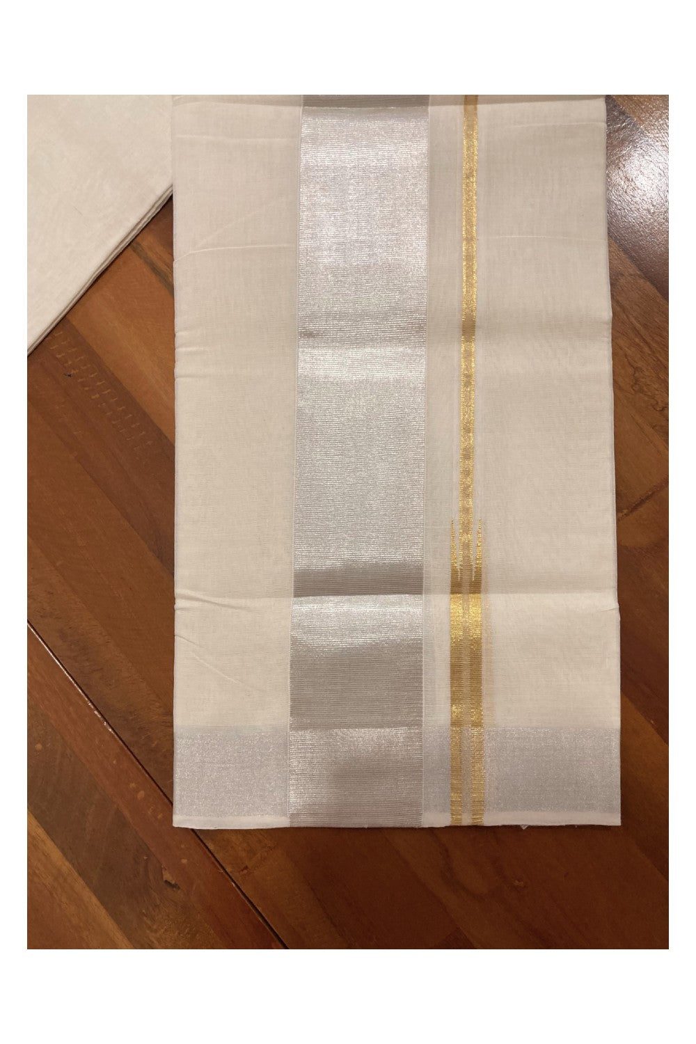 Southloom Balaramapuram Unakkupaavu Premium Wedding Handloom Mundu with 3 inch Silver Kasavu Border and Golden Chutti