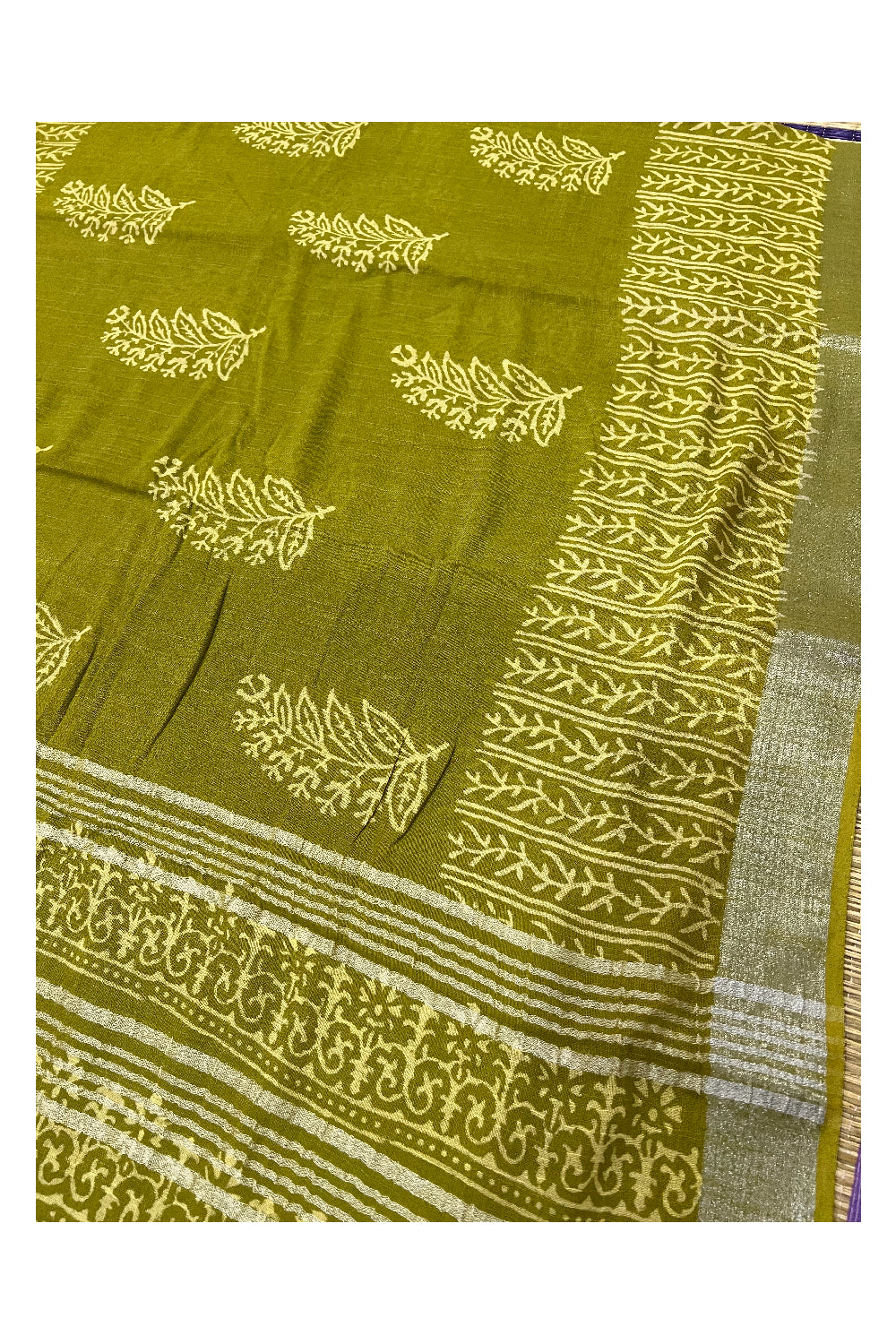 Southloom Linen Light Green Designer Saree with White Prints and Tassels on Pallu