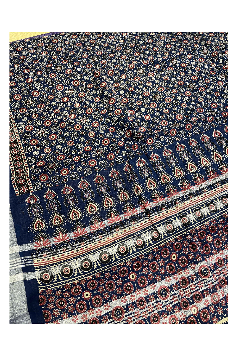 Southloom Linen Designer Saree with Ajrakh Prints on Dark Blue Body and Tassels on Pallu