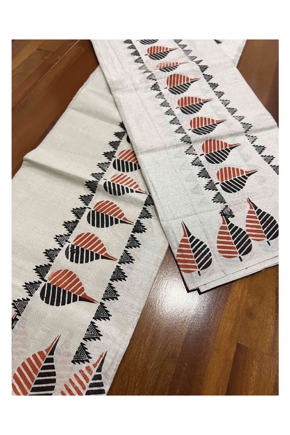 Kerala Silver Tissue Kasavu Set Mundu (Mundum Neriyathum) with Black and Orange Block Printed Border