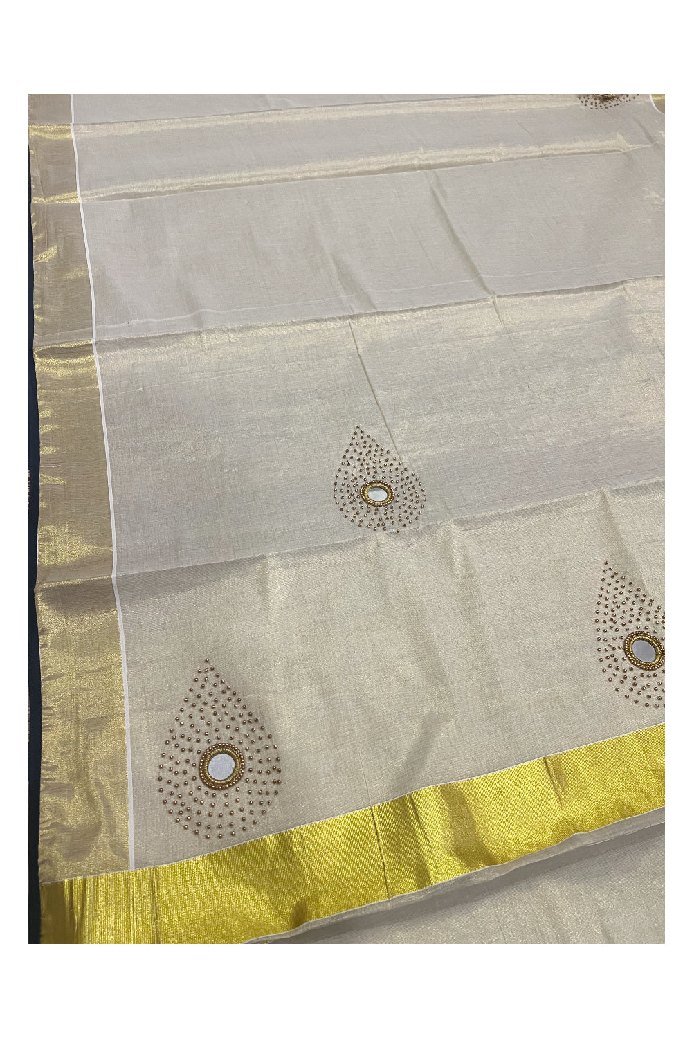 Kerala Tissue Kasavu Saree with Bead and Mirrorwork Design and Black Piping Works on Border