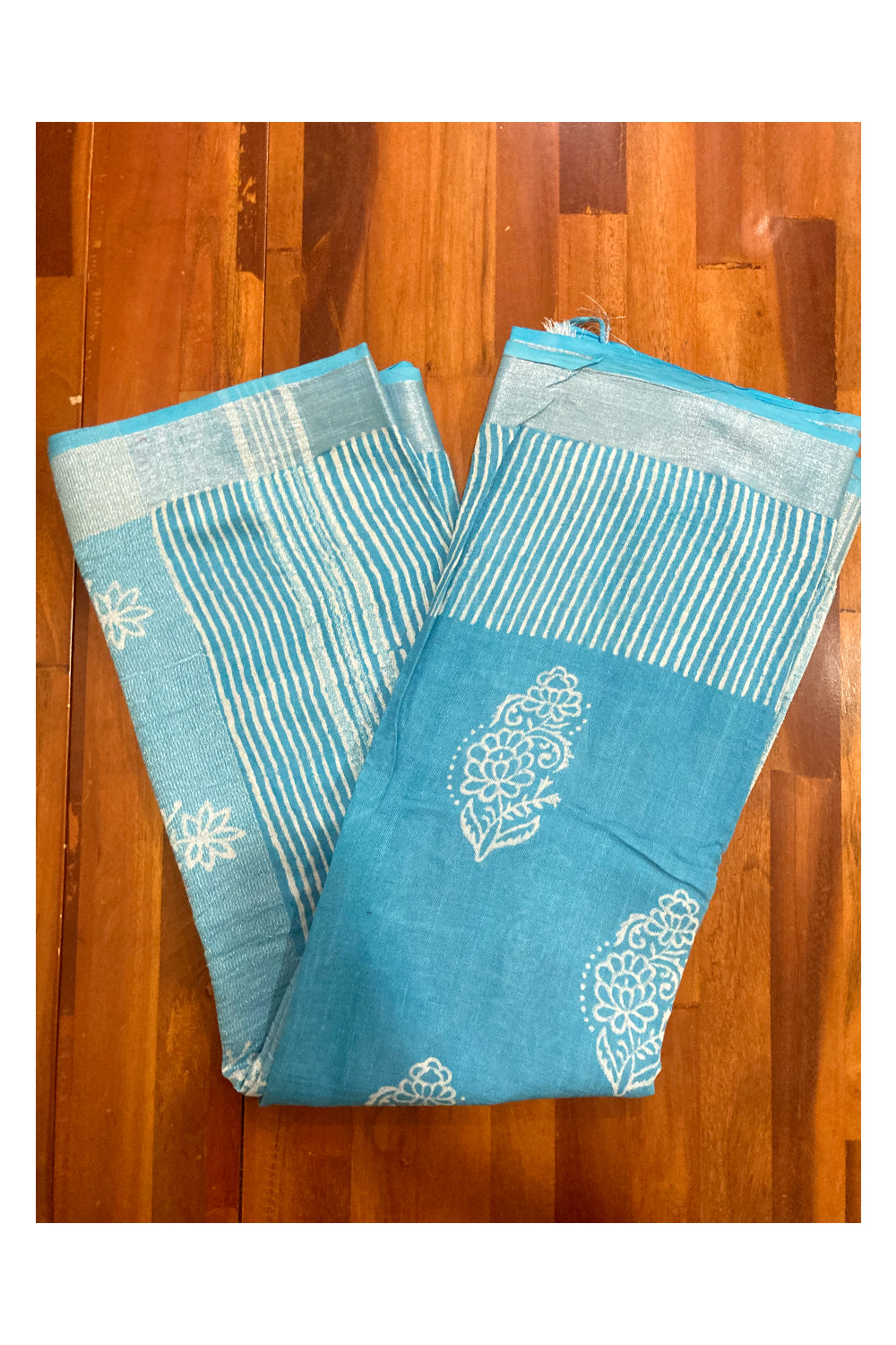 Southloom Linen Light Blue Saree with White Designer Prints and Tassels works on Pallu