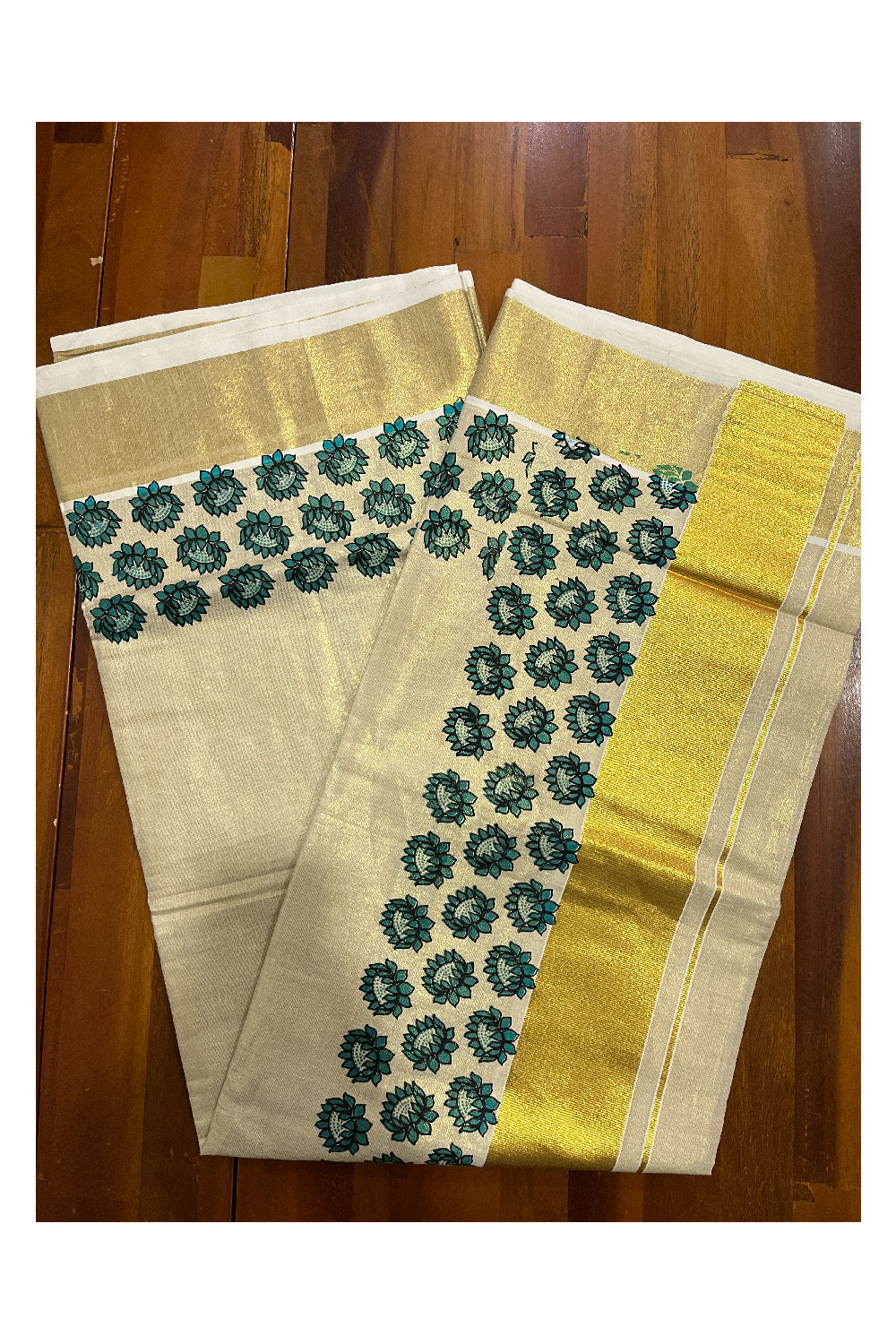 Kerala Tissue Kasavu Saree with Blue Floral Block Printed Design