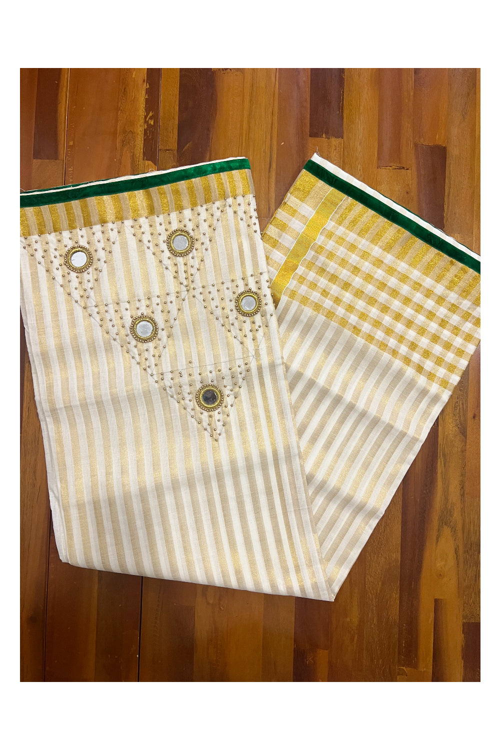 Kerala Tissue Kasavu Lines Saree with Bead and Mirrorwork Design and Green Piping Works on Border