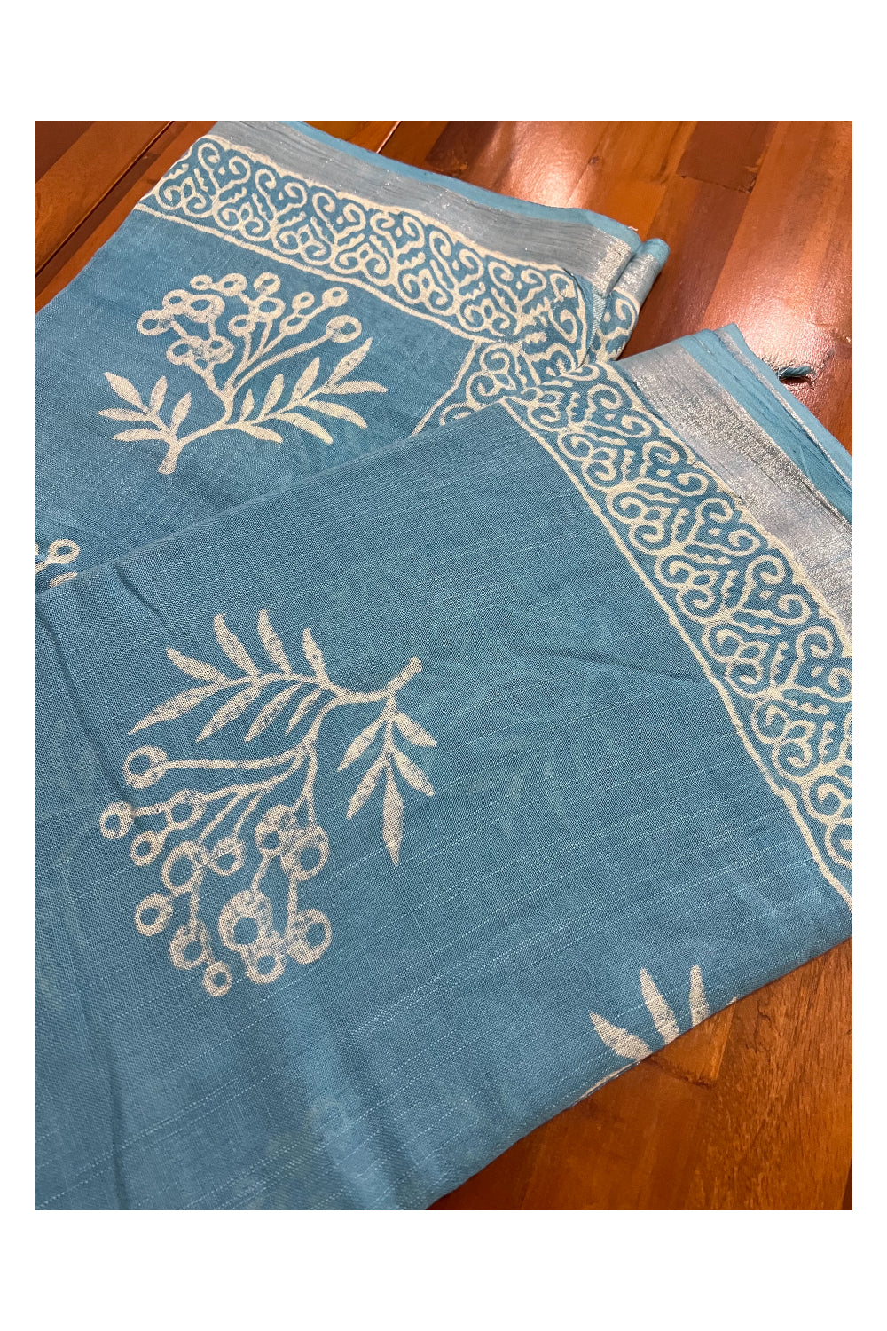 Southloom Linen Light Blue Designer Saree with White Prints and Tassels on Pallu