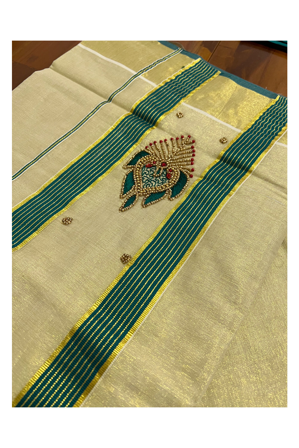 Kerala Tissue Kasavu Saree with Feather Themed Bead Work Design and Green Blouse Piece