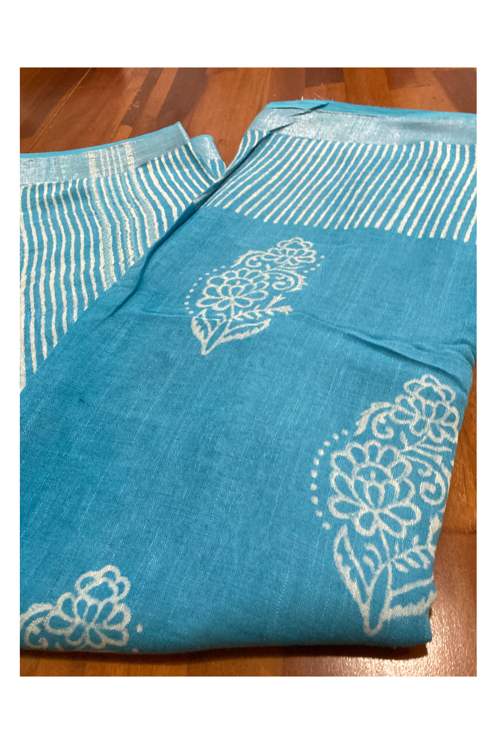 Southloom Linen Light Blue Saree with White Designer Prints and Tassels works on Pallu