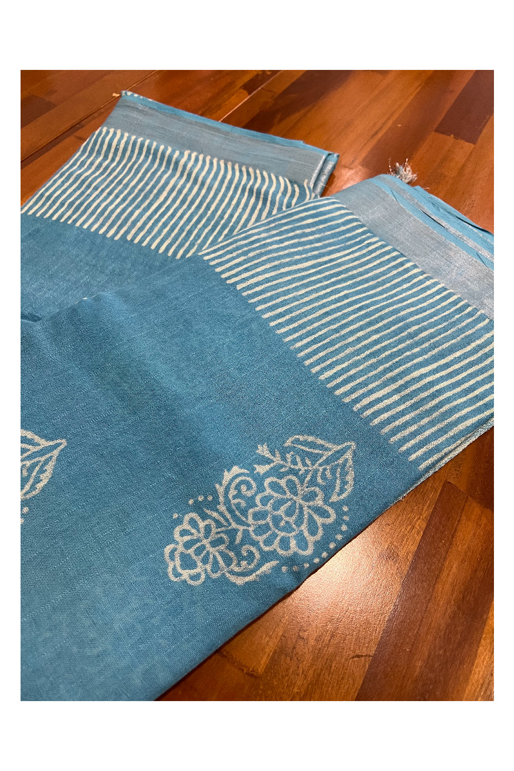 Southloom Linen Light Blue Designer Saree with White Prints and Tassels on Pallu