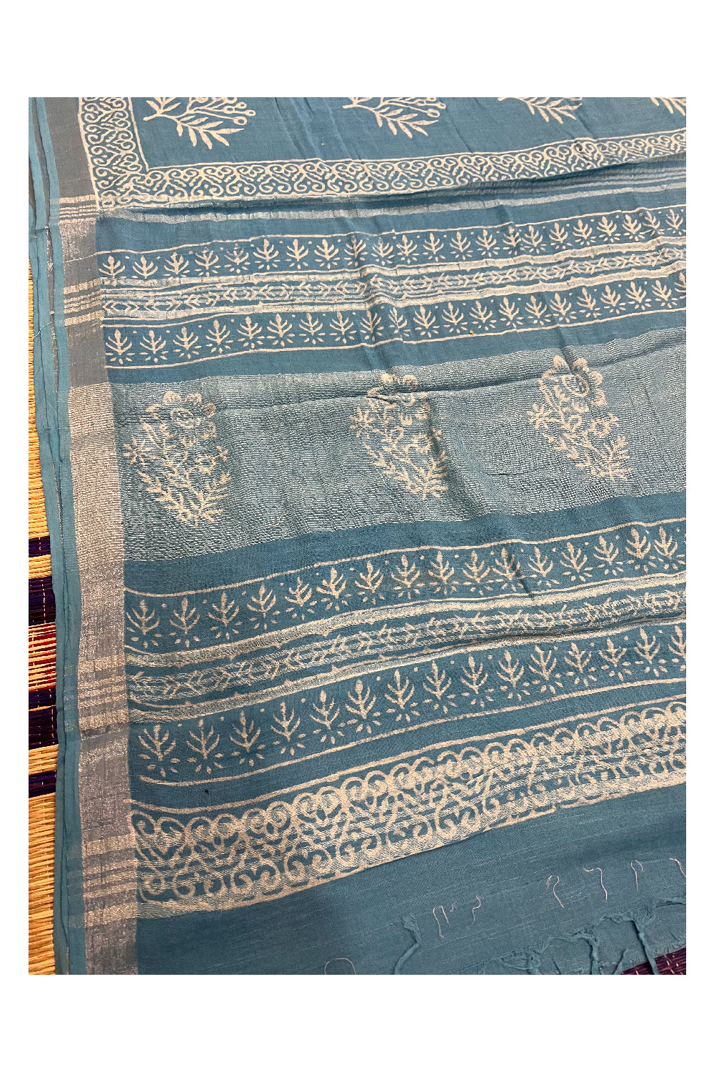 Southloom Linen Light Blue Designer Saree with White Prints and Tassels on Pallu