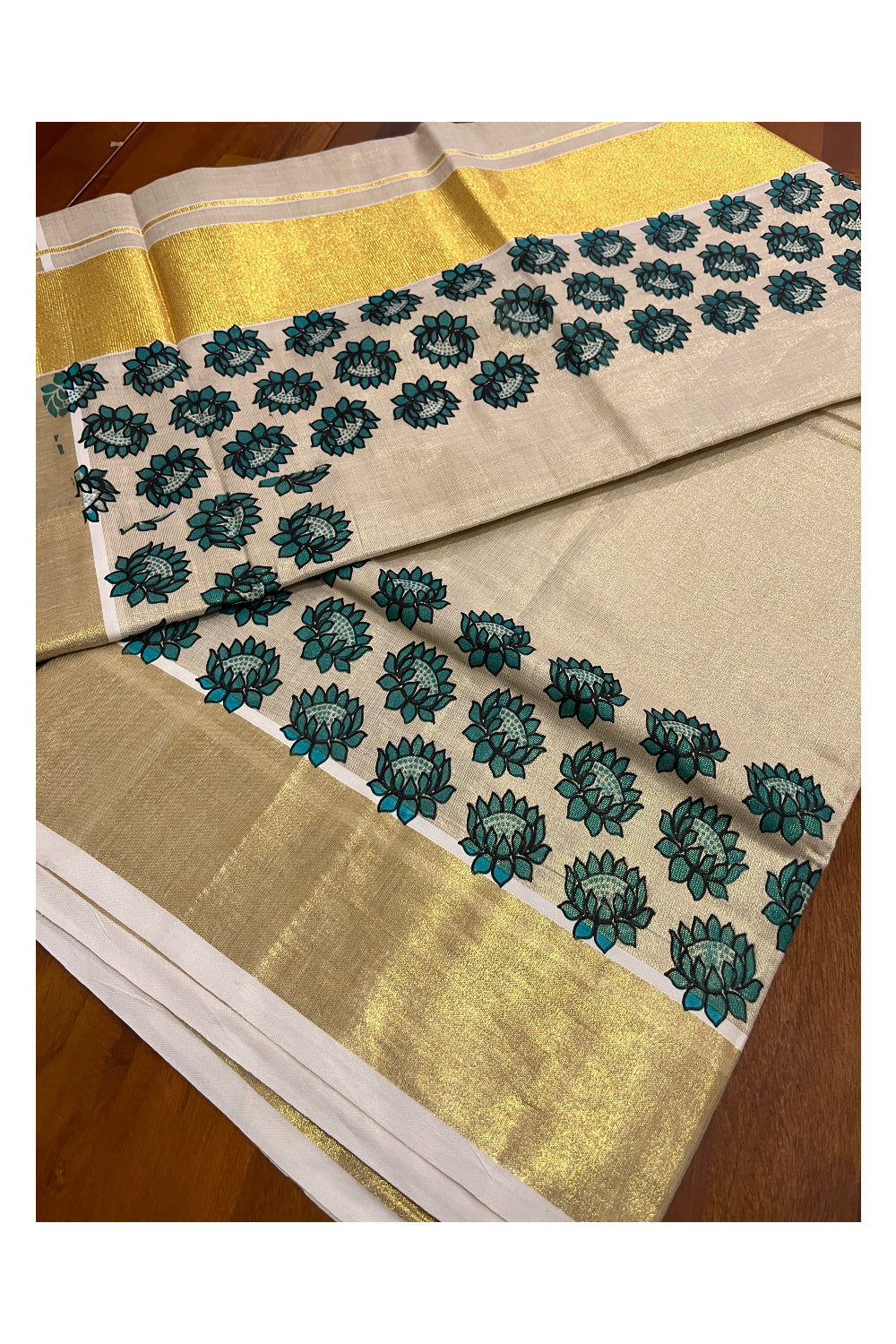 Kerala Tissue Kasavu Saree with Blue Floral Block Printed Design