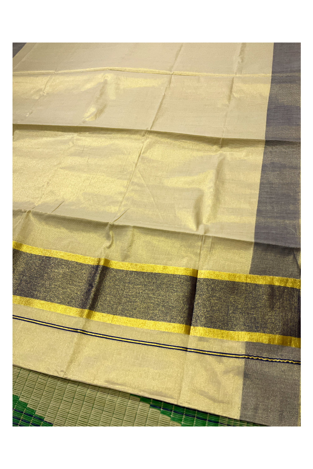 Kerala Tissue Kasavu Plain Saree with Blue and Kasavu Border