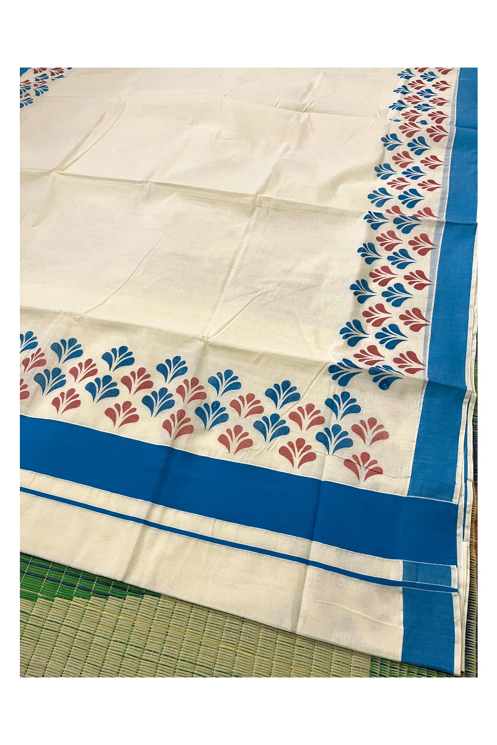 Pure Cotton Off White Kerala Saree with Blue and Red Block Prints in Blue Border