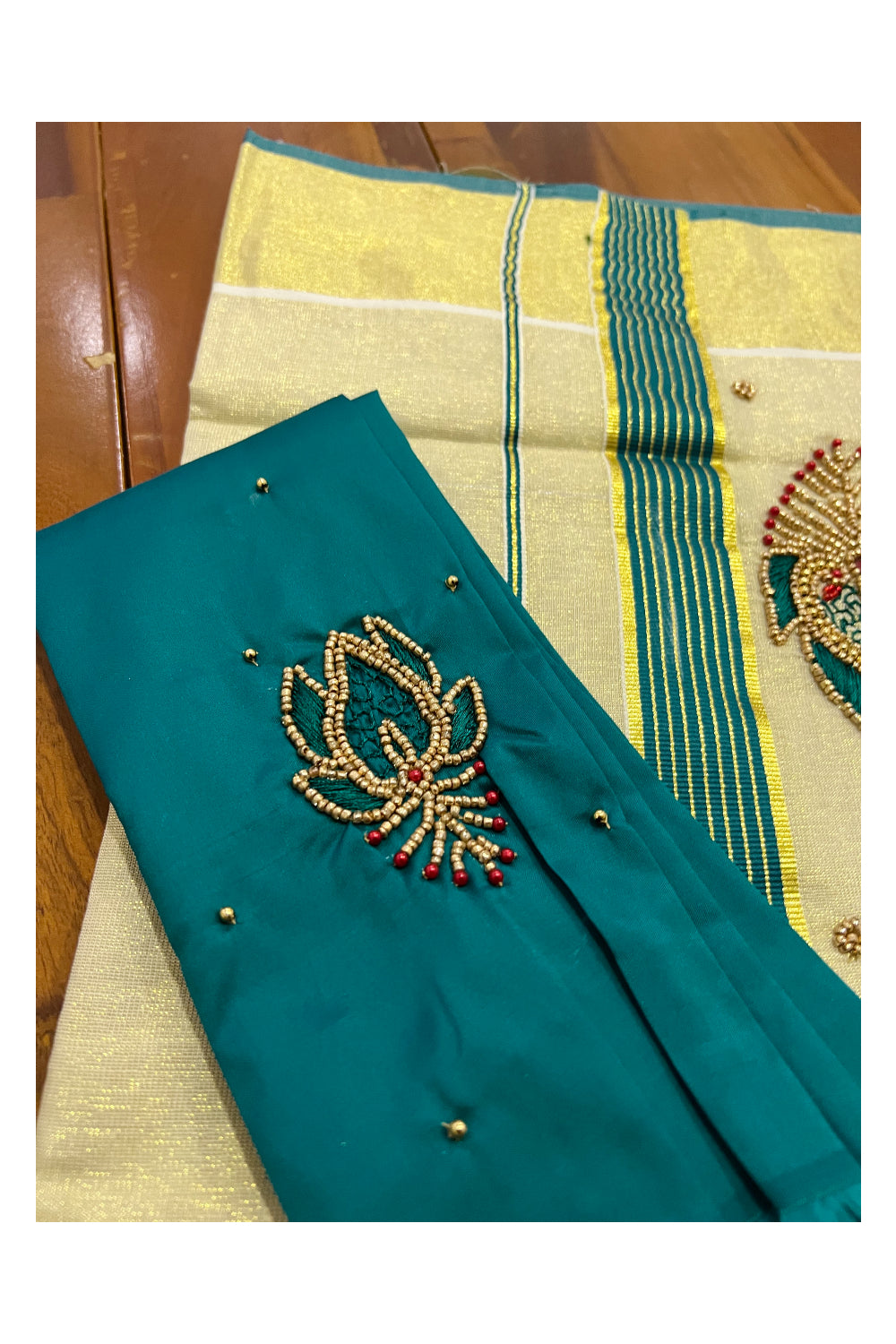 Kerala Tissue Kasavu Saree with Feather Themed Bead Work Design and Green Blouse Piece