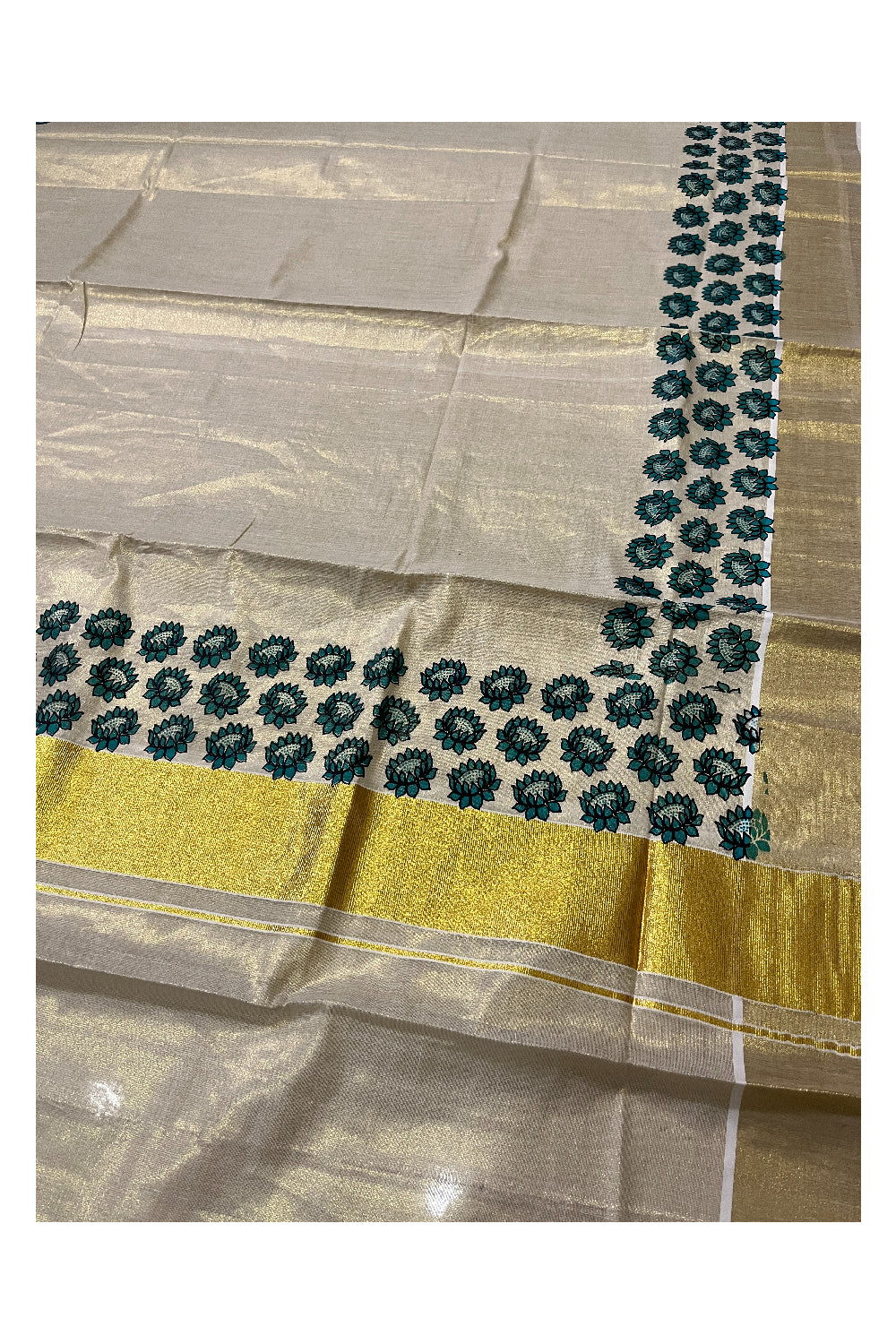 Kerala Tissue Kasavu Saree with Blue Floral Block Printed Design